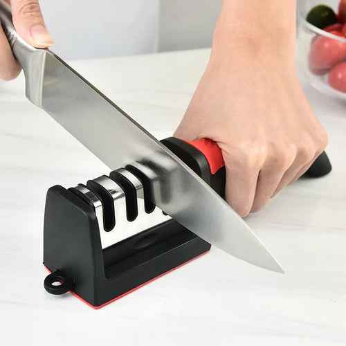4-in-1 kitchen knife sharpener sharpening a kitchen knife 