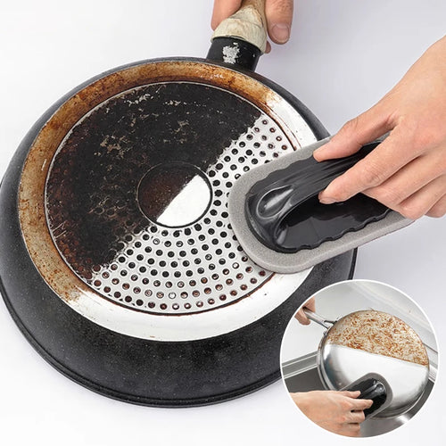 2-in1 Kitchen cleaning and scrub brush used to clean a frying pan