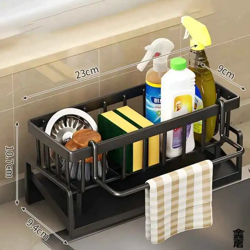 Black kitchen sink organizer rack with storage compartments and towel holder  
