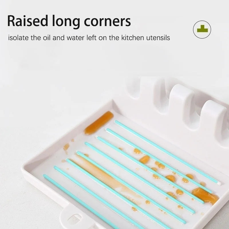 Kitchen utensil holder with raised corners for kipping utensil elevated and organized