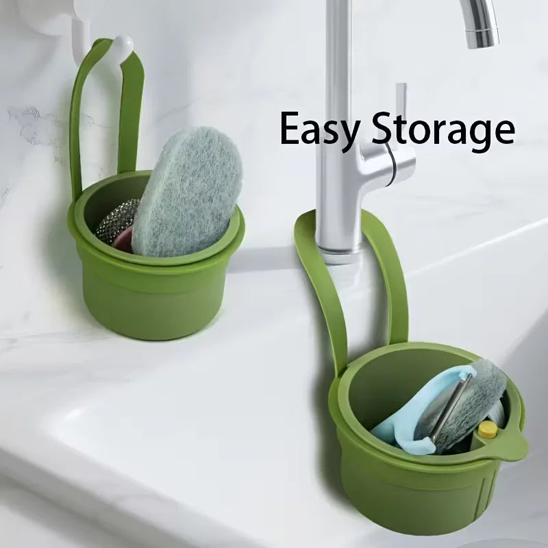 Green sink drain basket used for storing kitchen cleaning tools 